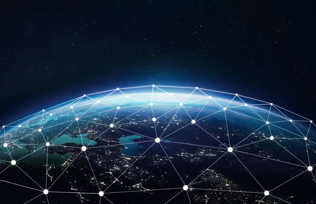 View of Earth from space at night with interconnected dots forming a network pattern across the globe, representing global connectivity, much like managed web hosting seamlessly linking WordPress sites worldwide.